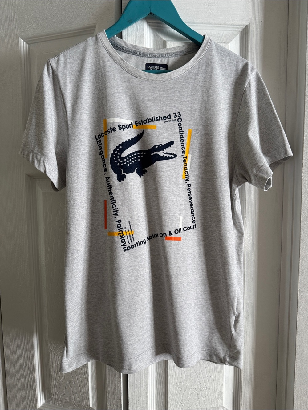 Lacoste Light Gray Short Sleeve Tee with Navy Croc and Yellow & Orange Accents